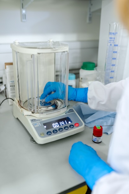 Cosmetic Scientist weiging protein peptide