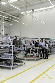 engineers working in automotive factory