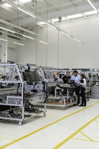 engineers working on a production line