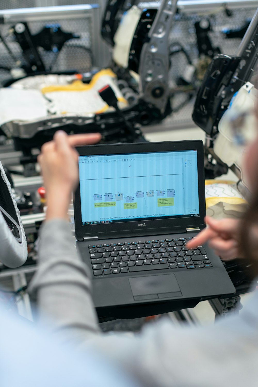 black laptop computer on table