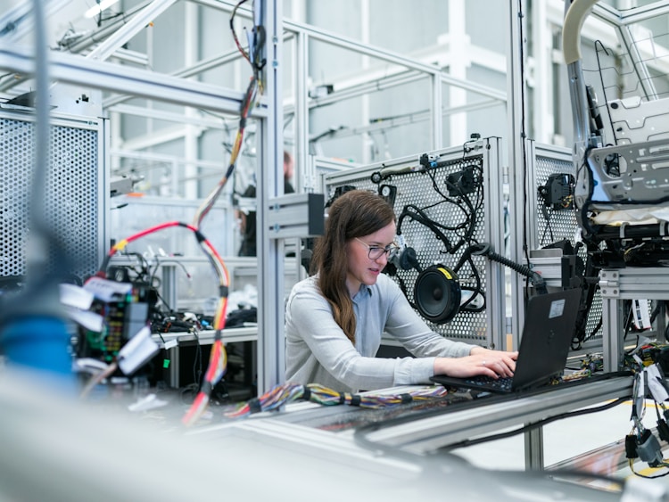 operator checking the translation of the technical user manual