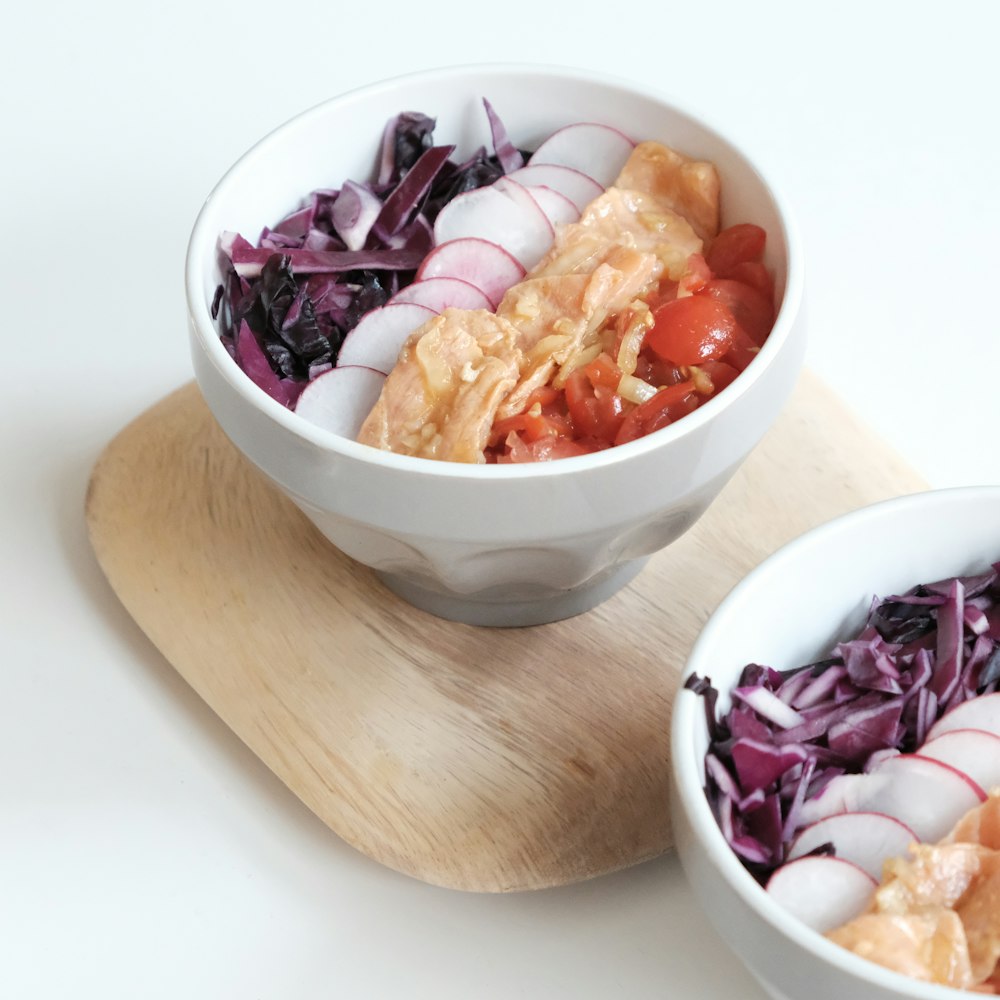 sliced onions in white ceramic bowl