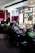 man in black and white checkered dress shirt sitting on black office rolling chair