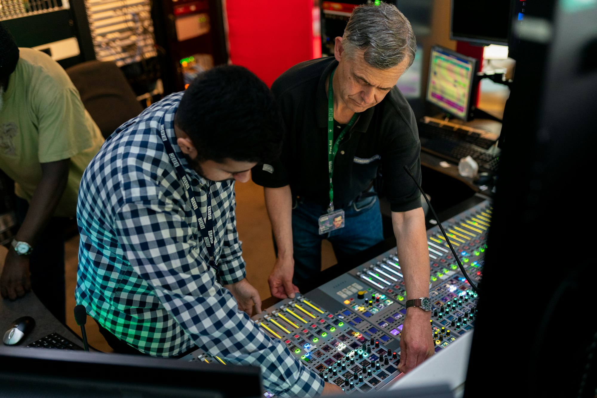 Broadcast engineers work in studio