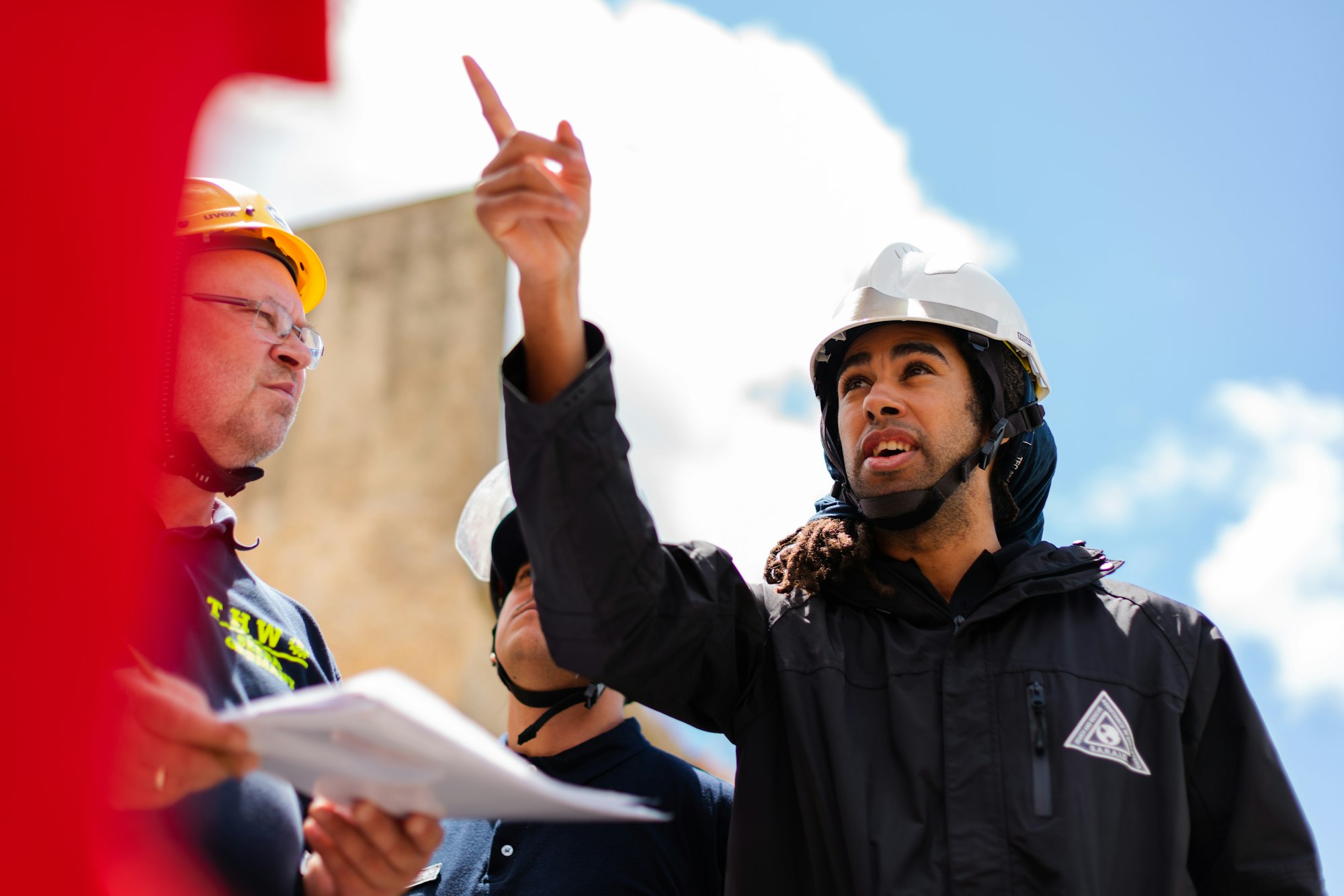 Male structural engineer leading a team.