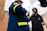 A professional consultant discussing safety regulations with a client in an office setting.