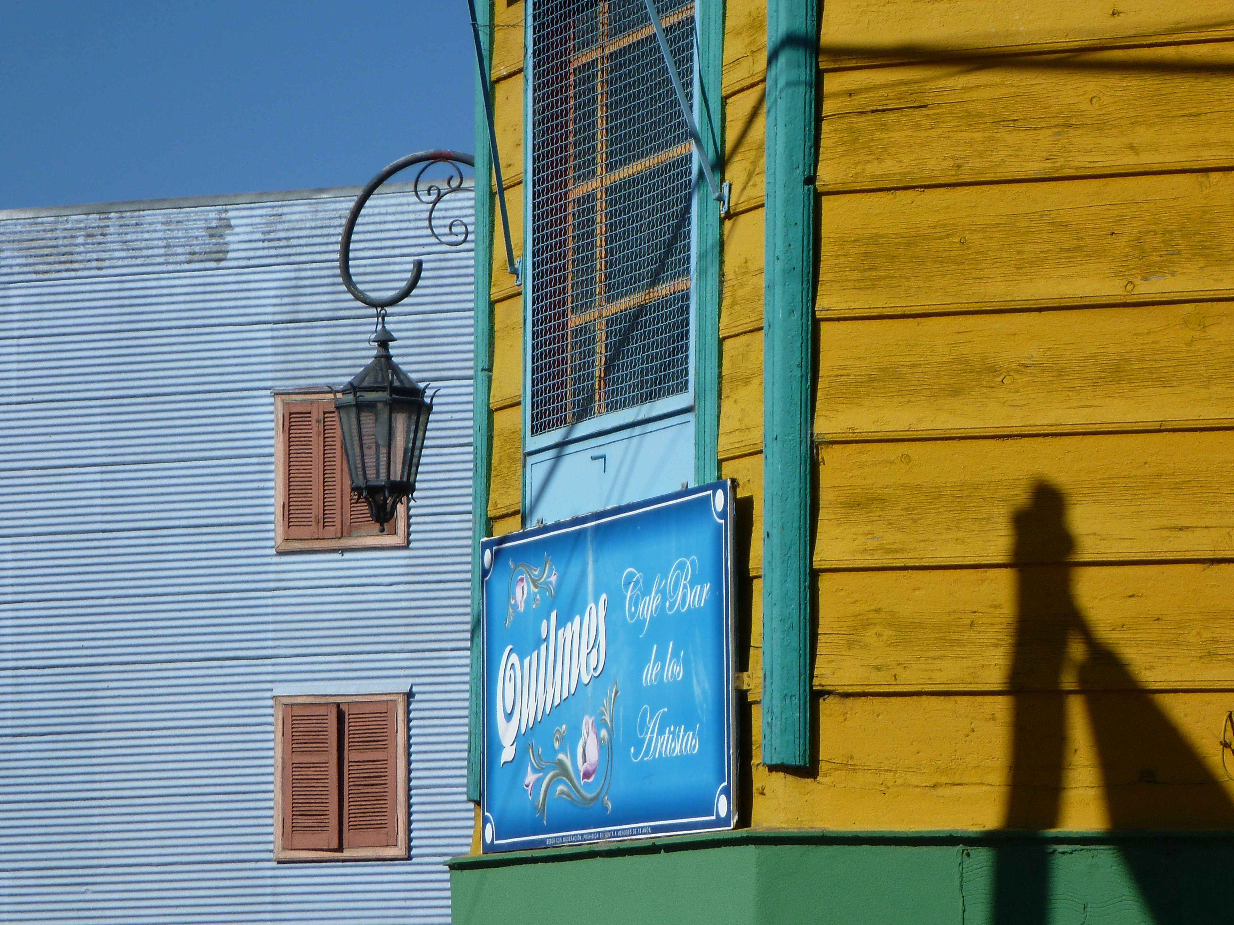 black metal framed wall lamp