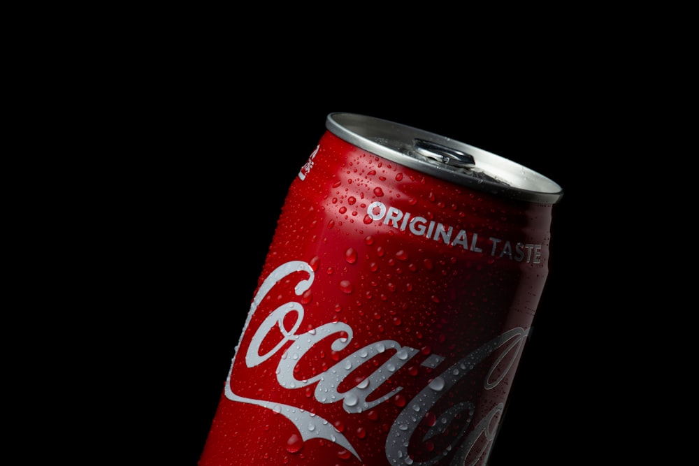 coca cola can on black background