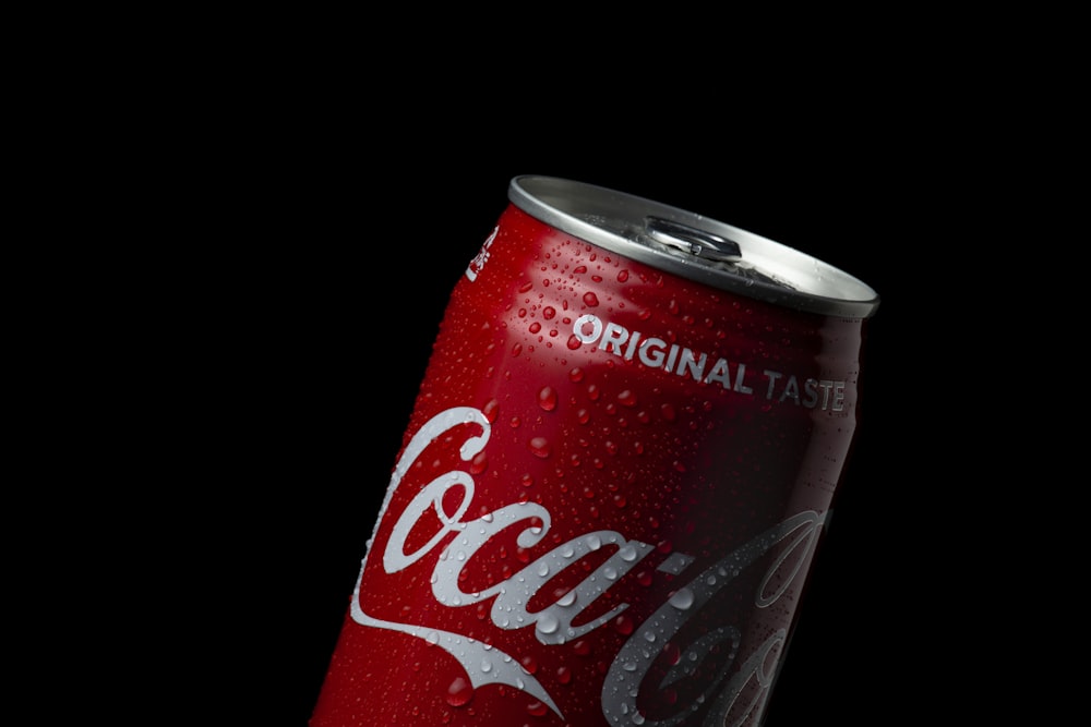 coca cola can on black background