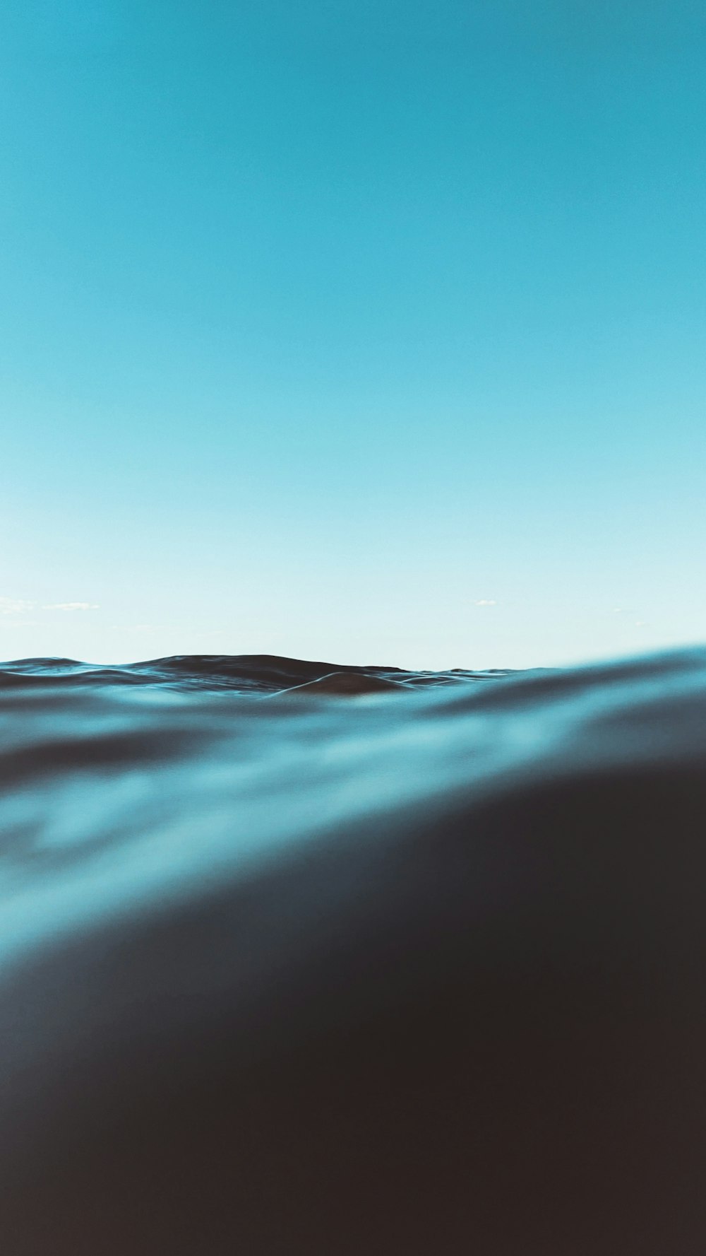 blue and white sky over the sea