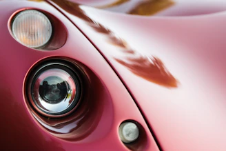 Before and after shots of a car with restored headlights.