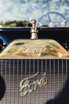 gold and black vintage car