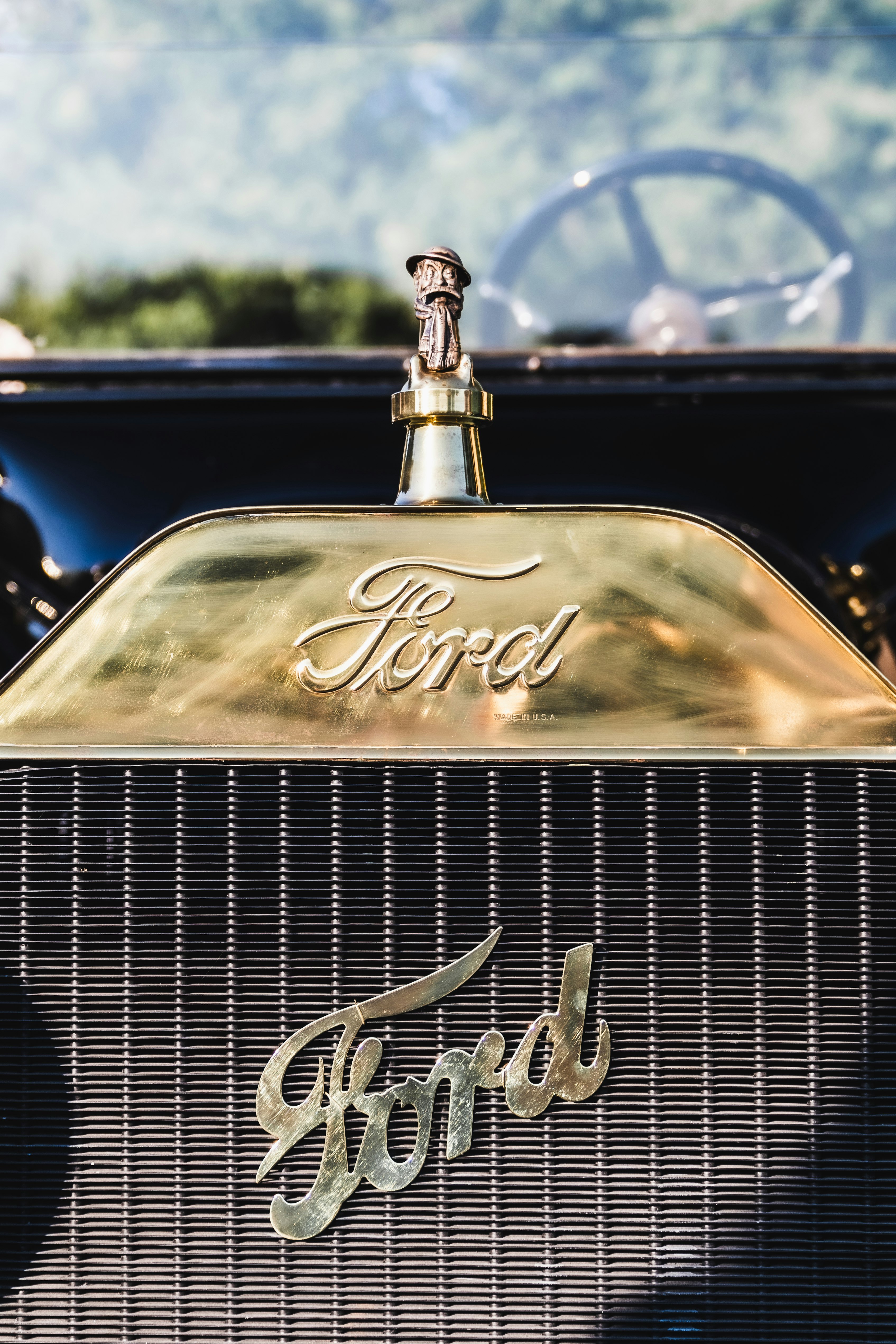 gold and black vintage car