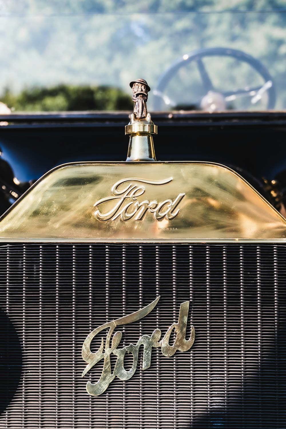 gold and black vintage car