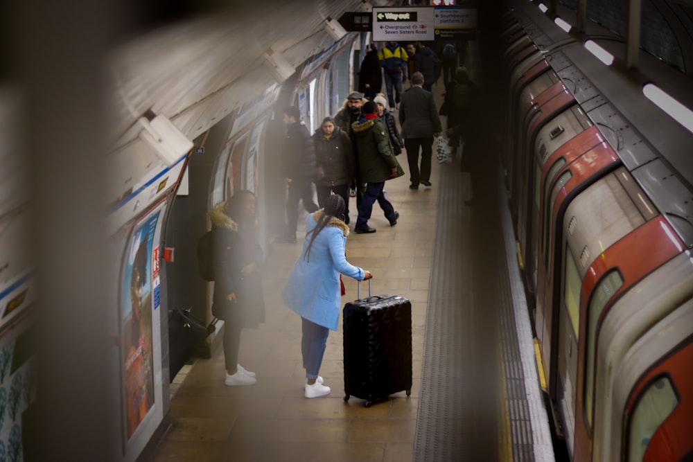 people walking on train station