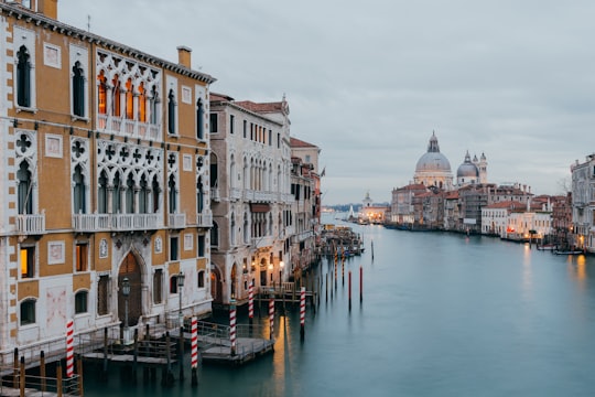 boat on water near buildings during daytime in Grand Canal Italy