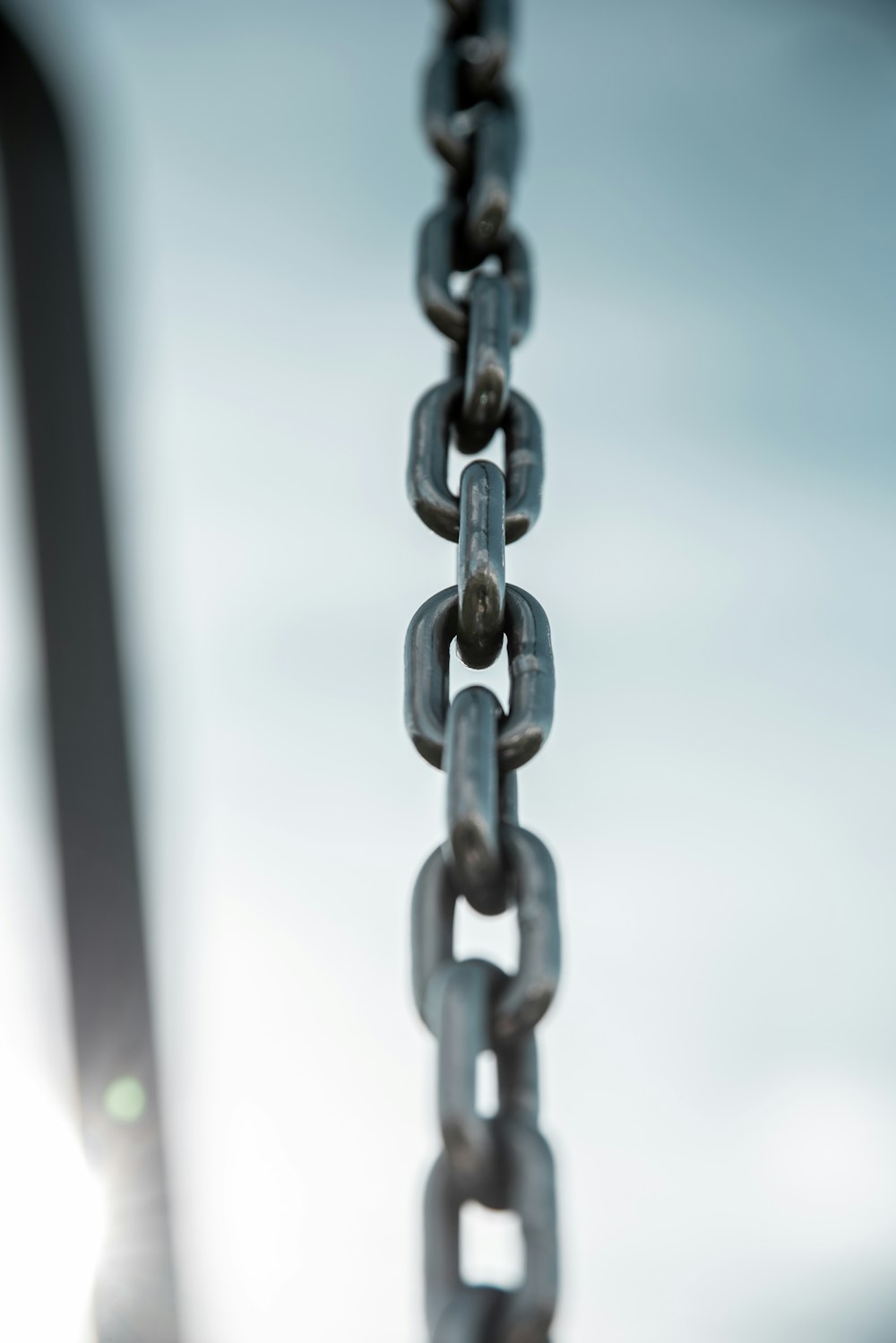 grey metal chain in close up photography