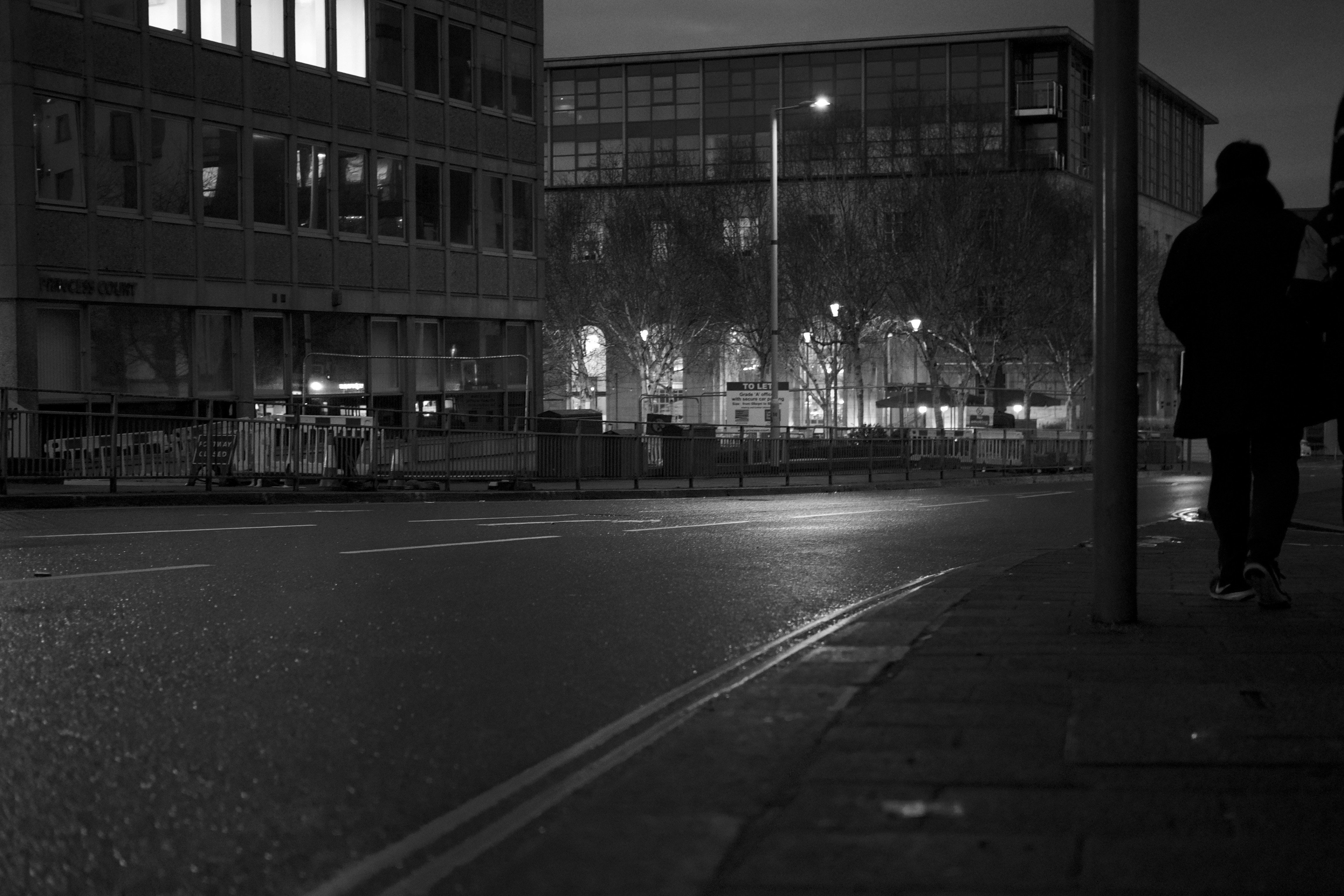grayscale photo of empty road plymouth teams background