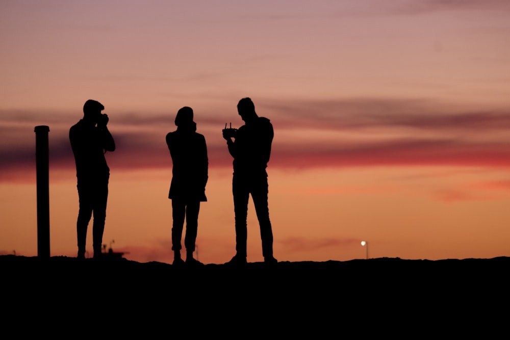 a group of people standing next to each other