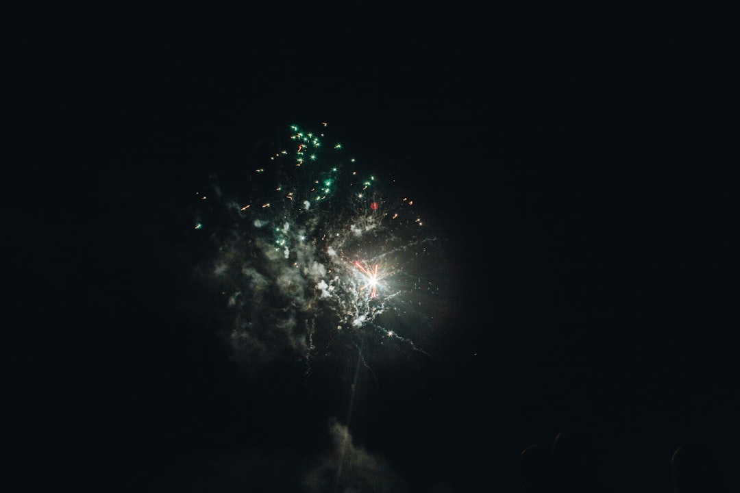 green and white light during night time