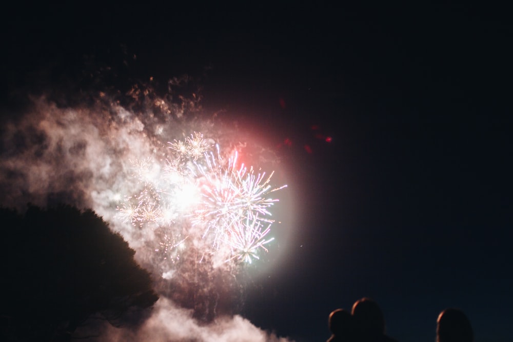 white fireworks in the sky during night time