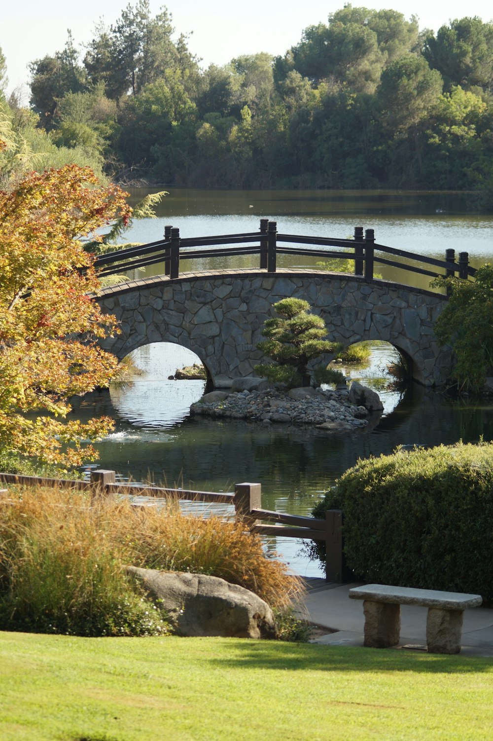 gray concrete bridge over river during daytime