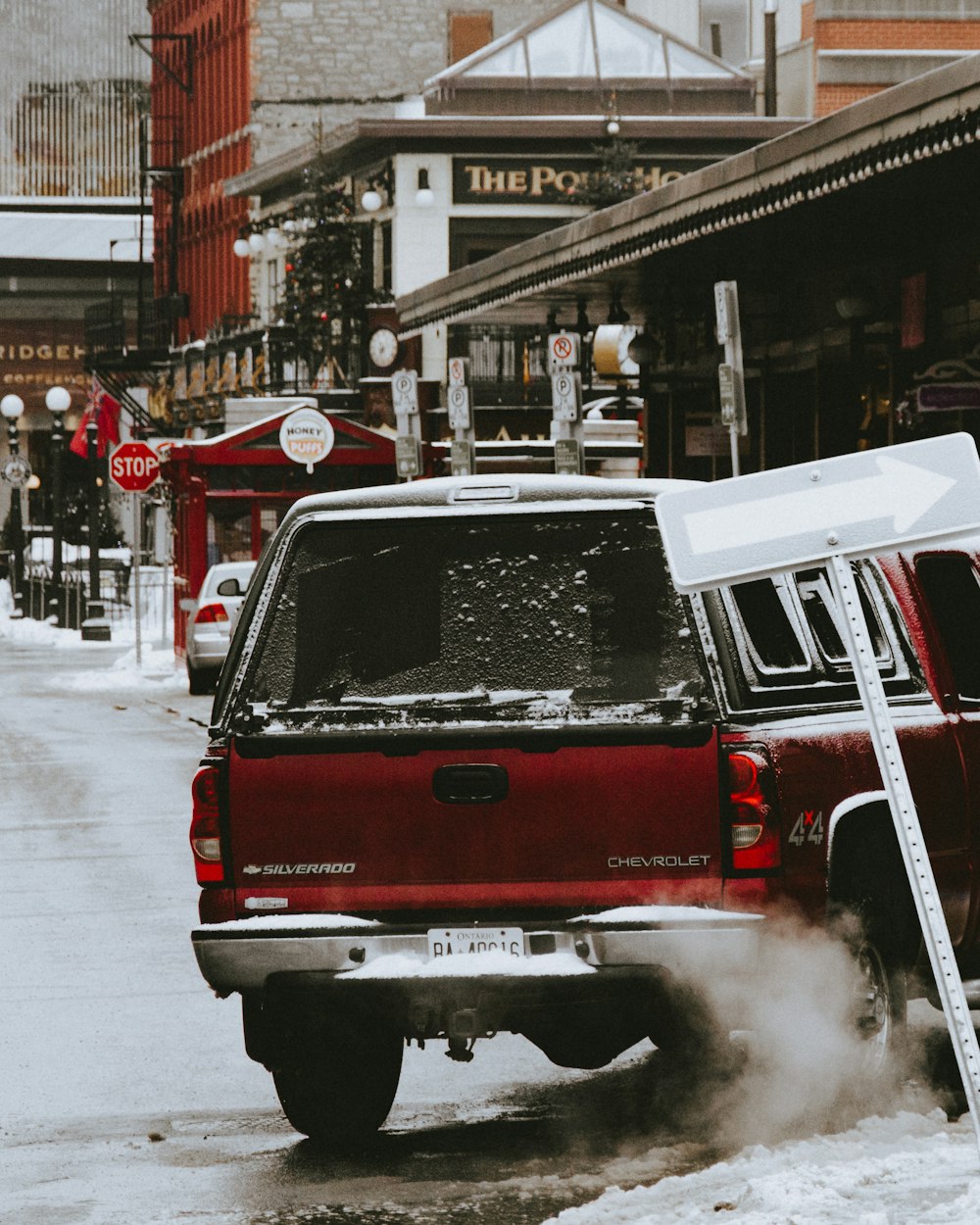 red and white van on road during daytime