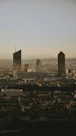 city skyline under white sky during daytime