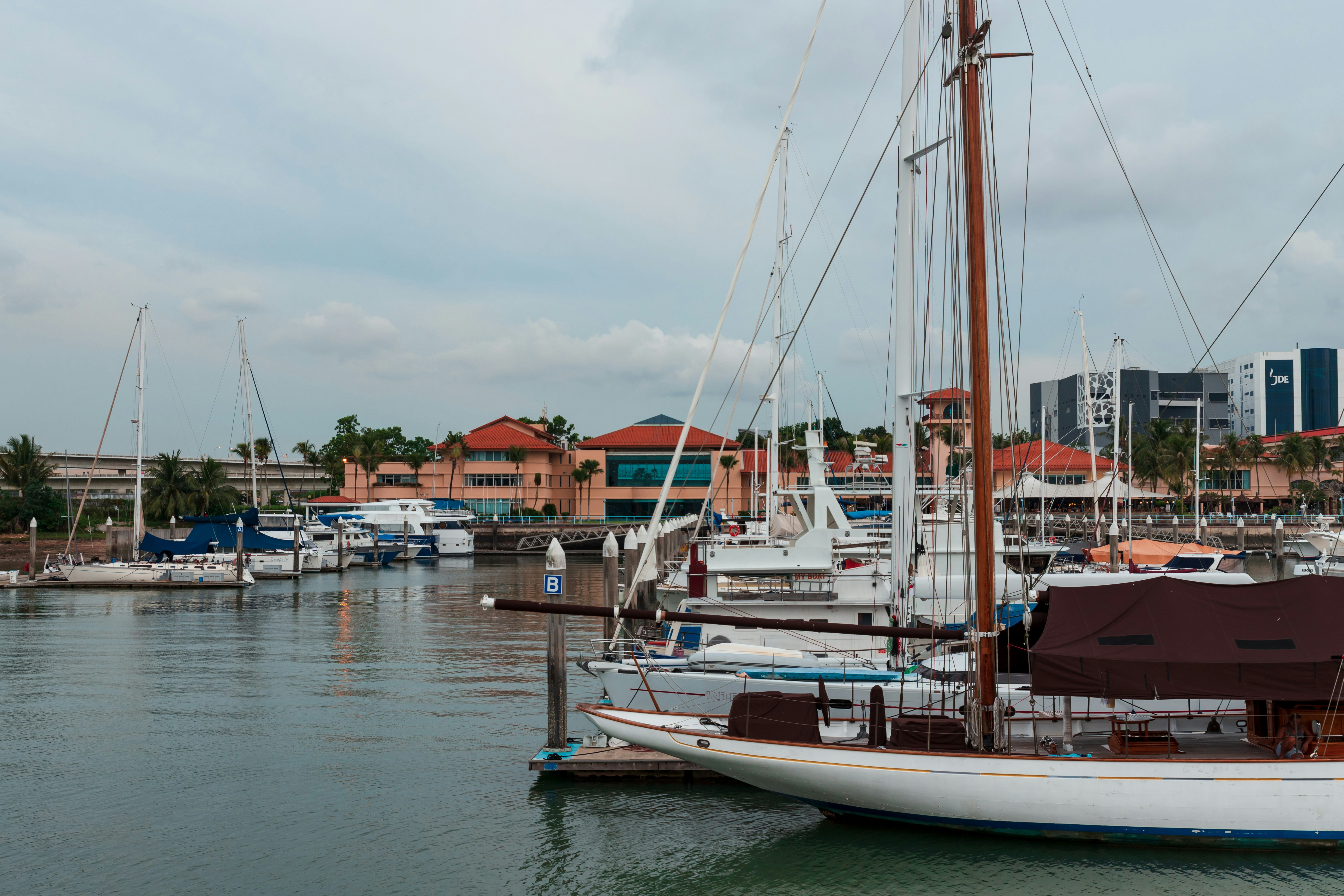 white boat on body of water during daytime