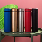 red and silver steel containers on blue round table