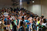 people in a stadium during daytime