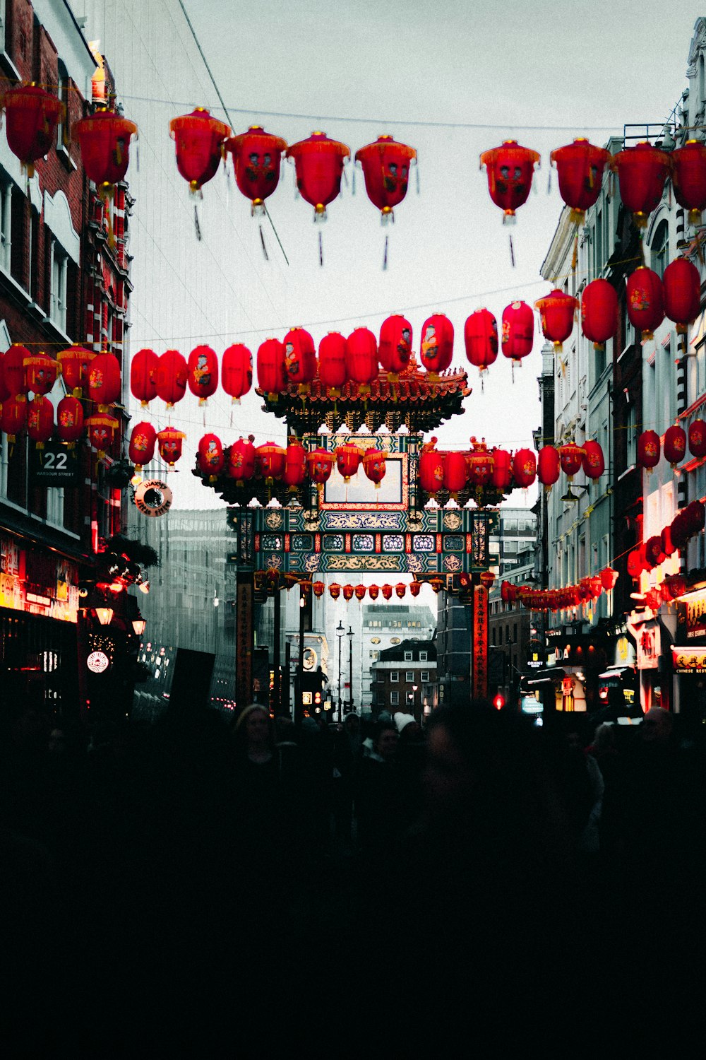 people walking on street during night time