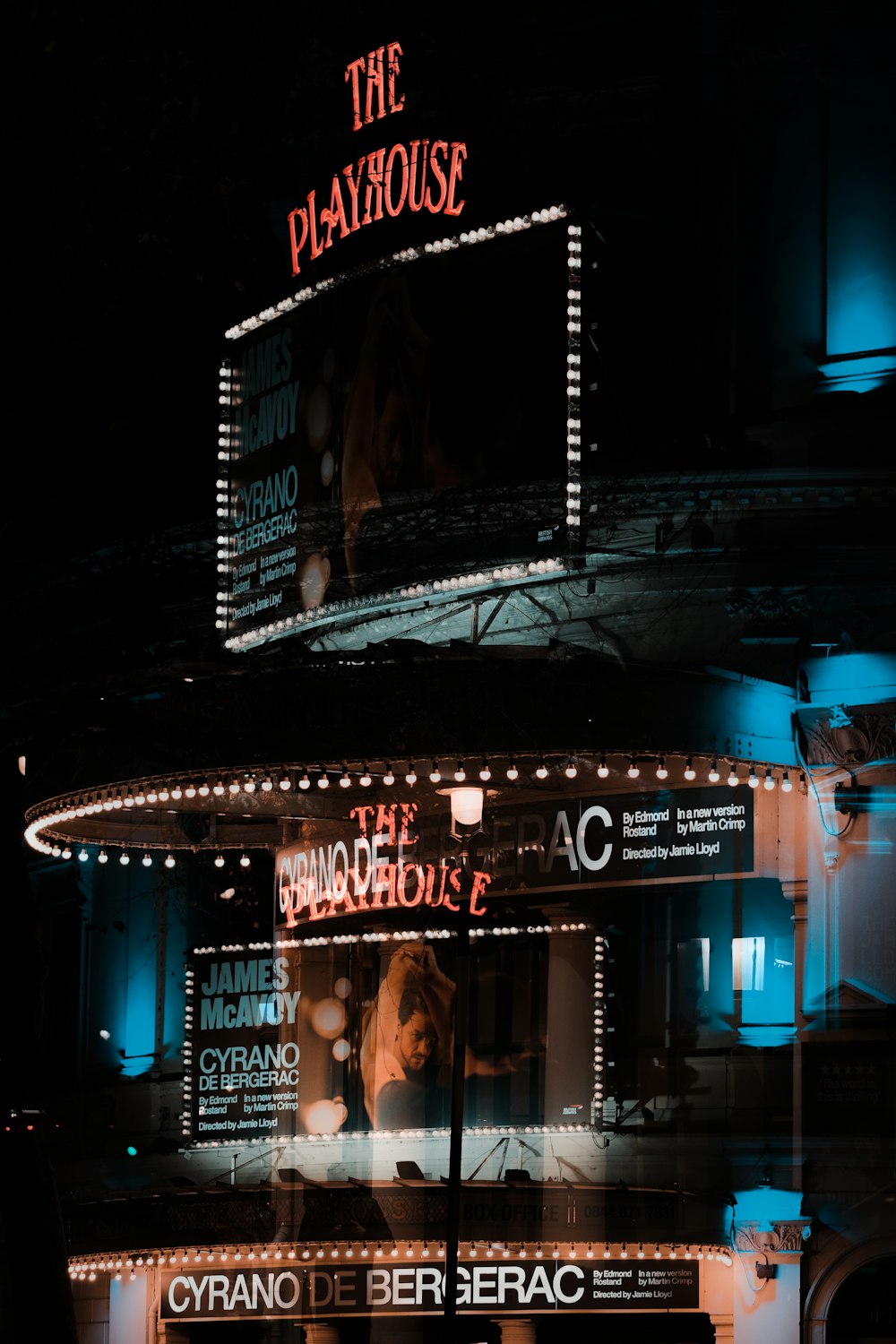 people walking on street during night time