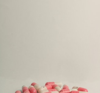 pink and white medication pill