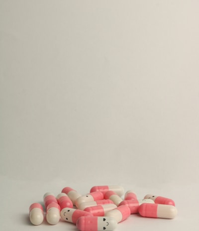 pink and white medication pill