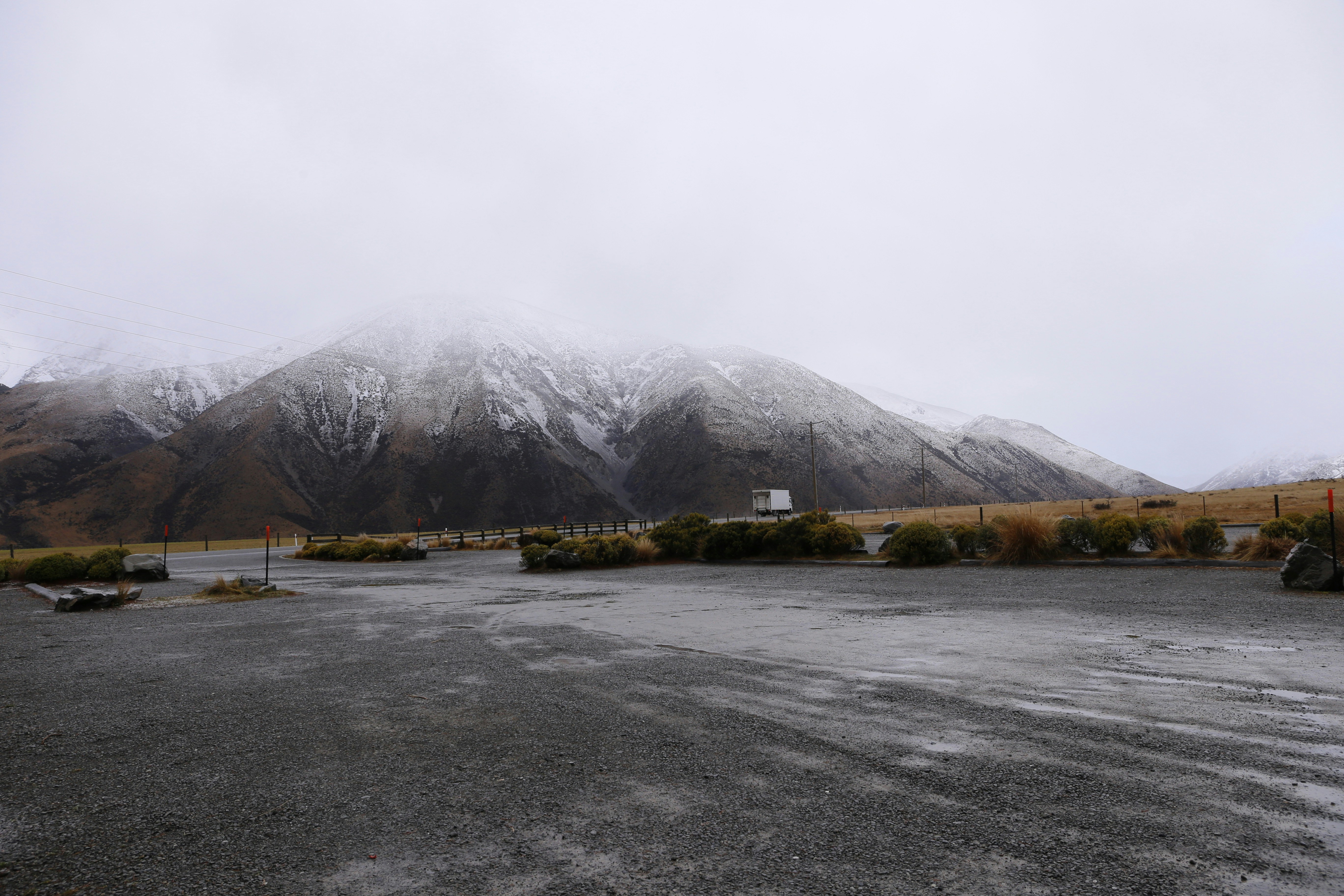 gray and white mountain under white sky during daytime