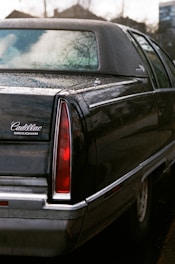 black car with white and red license plate