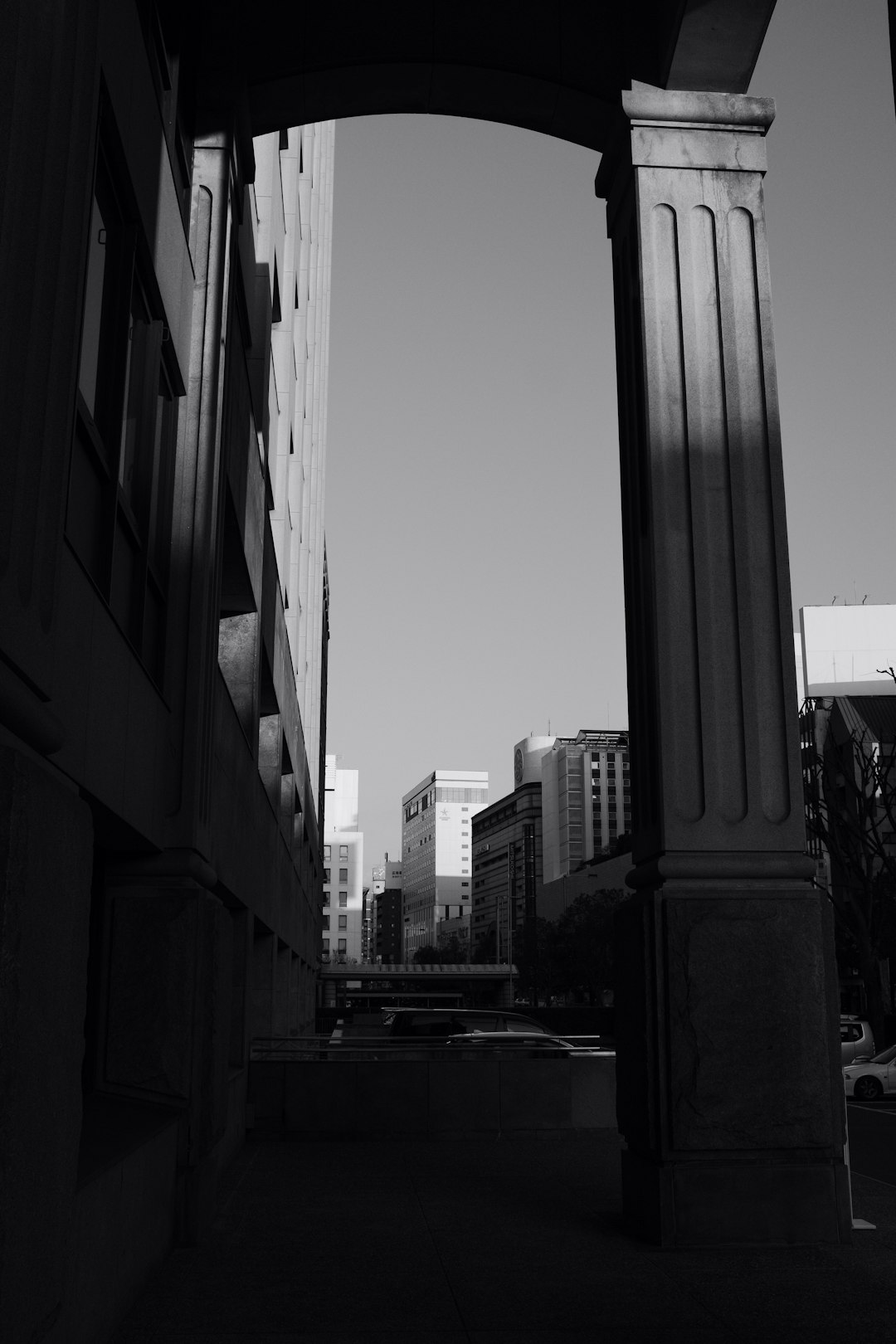 grayscale photo of high rise buildings