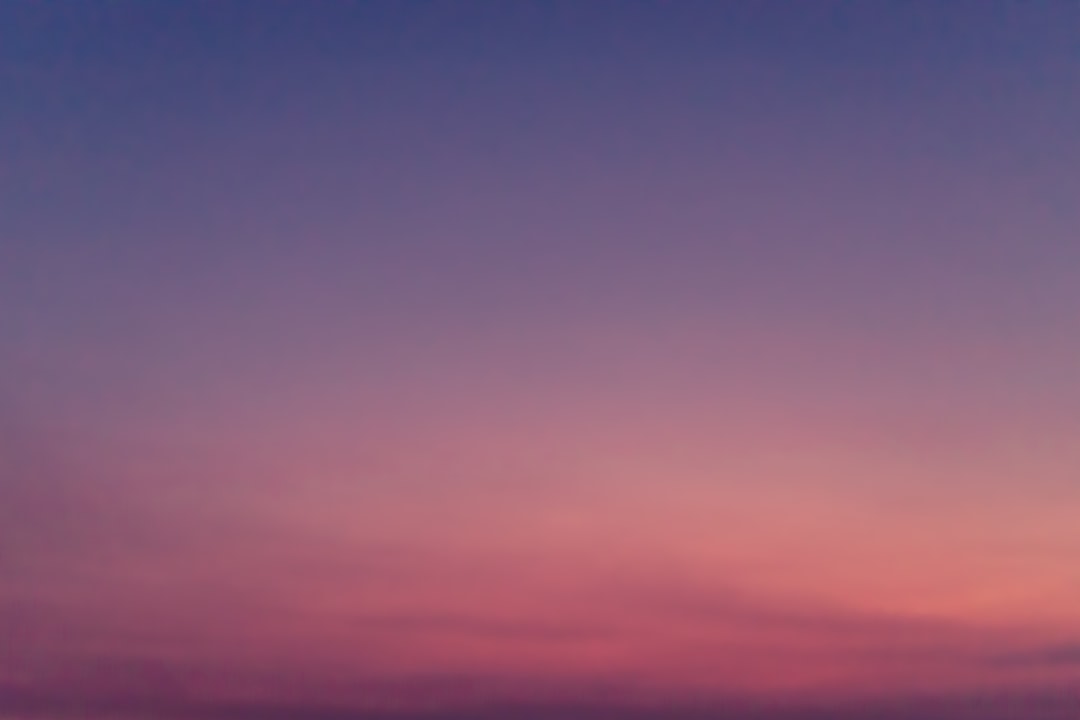 orange and blue sky during sunset