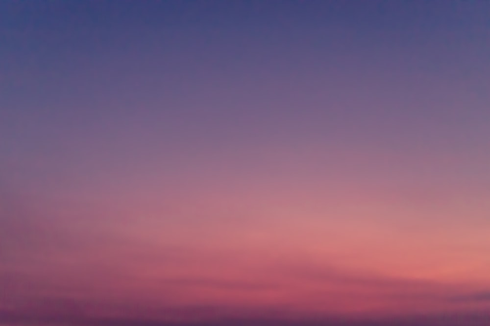 orange and blue sky during sunset