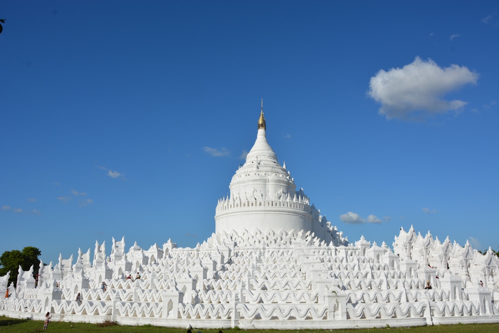 white concrete building under blue sky during daytime