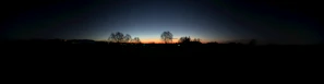 A panoramic view of the sunset crowd thinning, revealing the peaceful beauty beneath