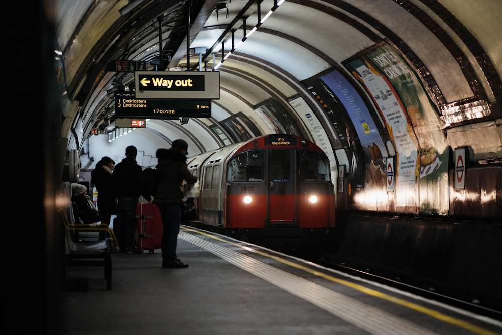 people walking on train station