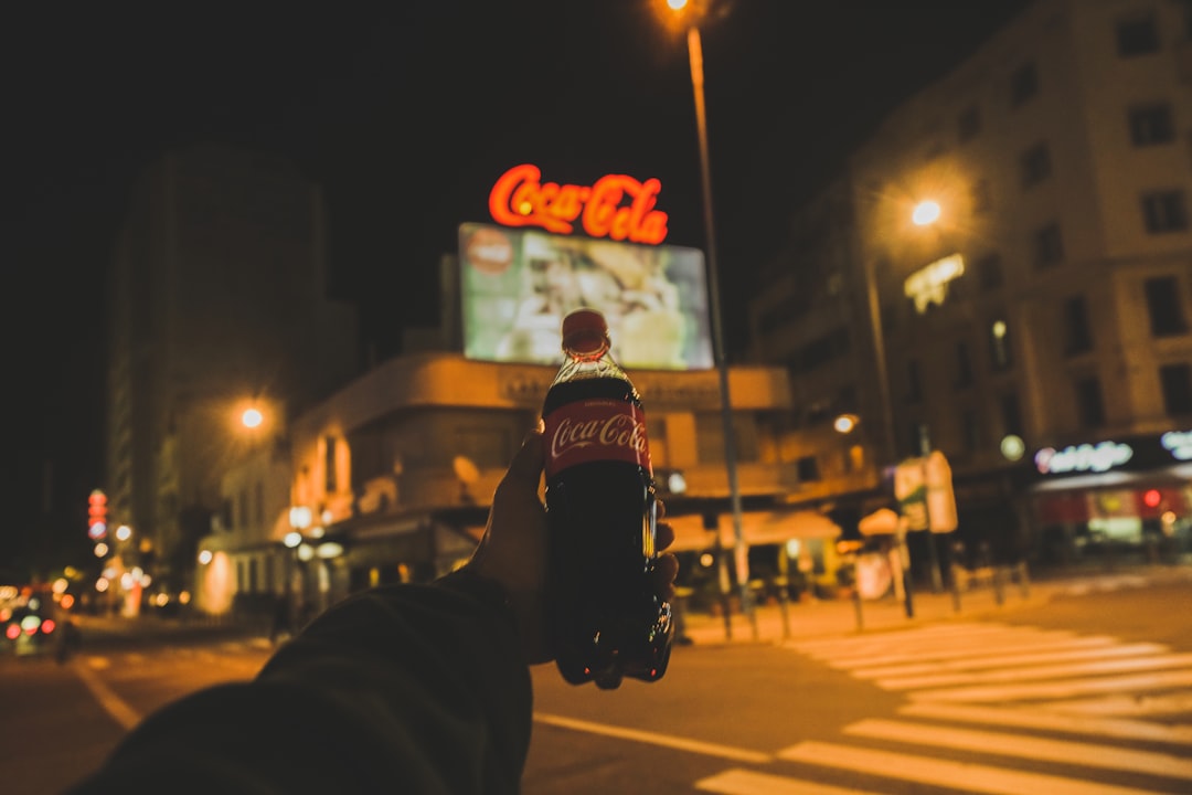 person in black jacket riding motorcycle during night time