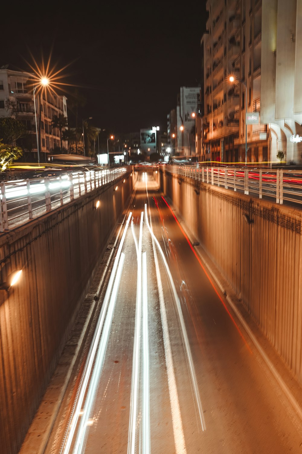 time lapse photography of cars on road during night time