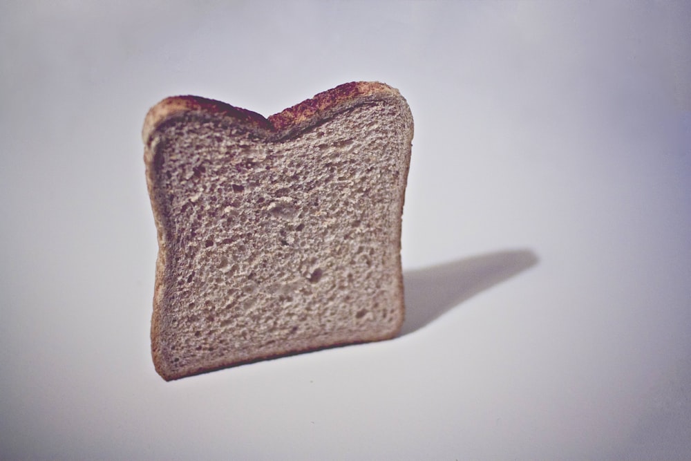 brown bread on white surface