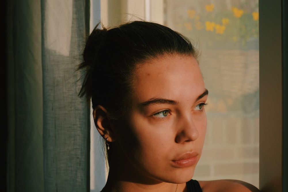 woman in black tank top