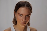 woman in white tank top