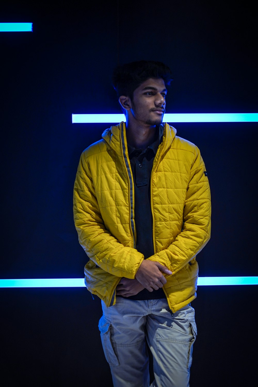 man in yellow zip up jacket