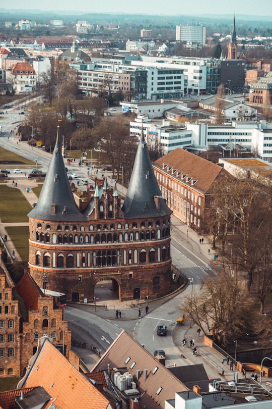 brown and black concrete building in Museum Holstentor Germany